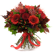 This sophisticated bouquet enlivens your house with the contrast of glorious winter colors.