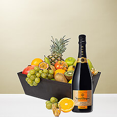 Discover the upscale gift that is perfect for everything from corporate gifting to family celebrations all year round. We hand pack the freshest seasonal fruit in a sophisticated leather style gift hamper and present it with a bottle of luxury Veuve Clicquot Vintage Champagne.