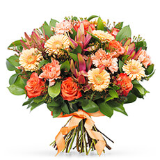 Brighten her day with this this vibrant bouquet in stunning fall colors. Beautiful flowers in gorgeous shades of orange are set off by fresh green accents and hints of bold pink.