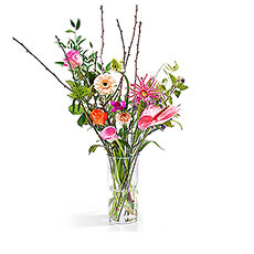 A gorgeous bouquet with mixed fresh flowers hand-picked by our master florist for a unique and radiant creation with every flower composition. This gift is completed with a box of Belgian Neuhaus Classic chocolate truffles as a delicious sweet treat.