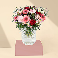 Send your affection with a beautiful bouquet of pink and red flowers. Our in-house florists create each exquisite bouquet by hand with lovely roses, Gerbera daisies, lilies, and other seasonal pink and red favorites. The freshest flowers are delivered daily from the flower auctions in Amsterdam to ensure that each blossom is picture-perfect.
