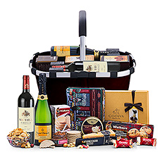 Our Royal Carry Bag collection gifts are the best gourmet gift baskets for any important corporate occasion or family celebration. The Red Wine & Lenoble Champagne edition includes legendary Veuve Clicquot Vintage 2008 Reserve Champagne and a beautiful Château de Courlat French Merlot, accompanied by an abundance of the finest gourmet foods.