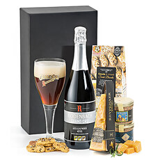 A bottle of Rodenbach Grand Cru Belgian beer is presented with Dutch cheese, a duo of artisan Belgian beer patés, and tasty biscuits.