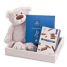 A newborn gift that pampers both the new mum and her precious baby, with a soft teddy and delicious Belgian treats in a handy eco bag.