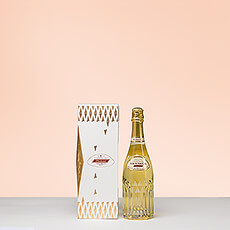 The bottle of champagne is stylishly presented in a luxurious champagne gift box.