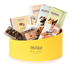 Send sunny greetings with this delicious collection of iconic Neuhaus Belgian chocolate pralines, fruit & nut chocolate Mendiants, and chocolate crisped rice Roses des Sables, and more.