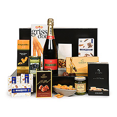 Make a statement of elegance with this prestigious Champagne and gourmet gift hamper. Signature of the House, Piper-Heidsieck Cuvée Brut is a non-vintage Champagne that is both harmonious and lively, reminiscent of the great richness of its blend of 100 wines. This classic Champagne is festive, crisp, and clean, and pairs perfectly with our impressive collection of European fine foods.
