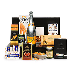 Make a statement of elegance with this prestigious Veuve Clicquot Rich Champagne and gourmet gift hamper. The Veuve Clicquot "Rich" Champagne is the first Champagne created especially to be combined with ice and a fresh ingredient. Specially blended for more potent fresh, fruity fruit aromas, Rich is comprised of 45% Pinot Noir for structure, 40% Meunier for roundness, and 15% Chardonnay for extra freshness. Enjoy its lively and persistent sparkle with our impressive collection of European fine foods.