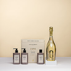 Presenting a gift set for pure pampering by the luxurious French brand Atelier Rebul. A stylish gift box with hand soap, shower gel, and lotion is paired with a delicious bottle of non-alcoholic Bottega Zero Sparkling Life.