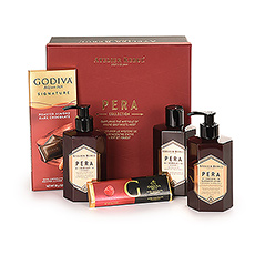 Want to give someone an original gift for a moment of relaxation and care? Choose this luxury gift box with unique body care products from the French brand Atelier Rebul and Godiva chocolate. This beautiful Pera gift set contains a shower gel, liquid soap and a lotion for hands & body, as well as a dark roasted almond chocolate tablet and a dark raspberry chocolate bar from the Belgian maître chocolatier Godiva.