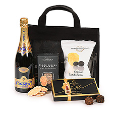 If you want to give a thoughtful gift, go for this black bag filled with Pommery champagne, Godiva truffles and salty snacks. Perfect for a toast to celebrate festive occasions with friends, family or business partners.