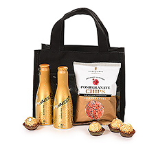 Celebrating together with a toast? For that, this festive gift bag with bubbles & bites is the perfect present.