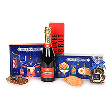 Delicious Jules Destrooper biscuits, tasty Gianduja chocolates, Leonidas Mendiants in three flavours and, as the topper, a bottle of Piper Heidsieck champagne make up a tasteful and sparkling end-of-year gift.