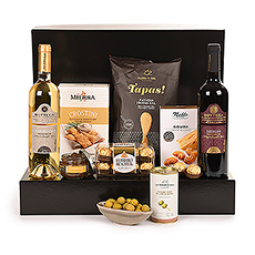 The perfect gourmet gift basket for wine lovers? Check out this Ultimate Gourmet gift box filled with red and white Bottega wine, crisps, cheese biscuits, olives, crostini, tapenade and chocolate. Its the ideal present to treat someone with a nice glass of fine wine and matching bites.