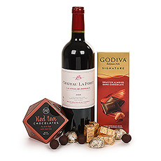 Important moments in life call for a very special gift. Like this delicious red wine Château La Forêt and chocolate gift basket. Have it sent to someone special to celebrate and surprise them.