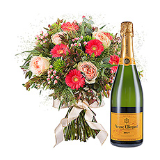 Send a fresh and colourful bouquet, hand-tied by our in-house master florist with ravishing, day-fresh seasonal flowers. This gift combines a medium-sized bouquet with a festive bottle of sparkling Veuve Clicquot Brut Champagne as a bubbly drink to savour while enjoying the look of the gorgeous bunch of flowers.