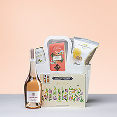 Summer calls for enjoying picnics with friends and family on warm, sunny afternoons. A beautiful French rosé wine, Destrooper cookies, and gourmet treats are handpacked in a reusable Koziol tote to take the good times on the go. It's a great gift for summer weddings, birthdays, anniversaries, and more.