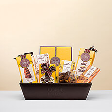 Discover the ultimate gift for chocolate lovers: a beautiful brown hamper filled with Belgian chocolate delights from Corné Port-Royal.