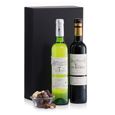 A classic and elegant gift of French Bordeaux wine (one red and one white) from Château des Tourtes and oh-so-satisfying chocolate-covered nuts.