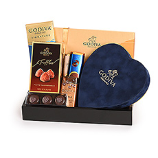 Send this sophisticated Godiva chocolate gift to express your affection. The centerpiece of the gift is a handsome blue velvet heart gift box with seven exquisite chocolates.