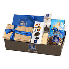 Surprise chocolate lovers with a fine assortment of Leonidas Belgian chocolates! An elegant collection of carefully wrapped blue and white gift boxes.