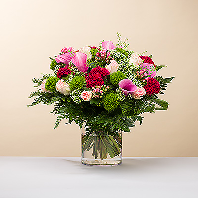 Think pink with our large Pink Perfection bouquet! 

Our expert in-house florists hand create this beautiful bouquet with pink roses, lilies, and other pink blossoms, set off by an array of greens with interesting textures. The freshest flowers are delivered daily from the flower auctions in Amsterdam to ensure that each blossom is picture-perfect.