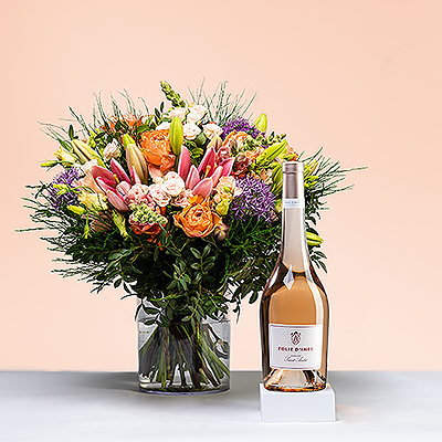 Delight her with the perfect pairing of an exquisite handtied bouquet and delicious French rosé wine. This flower and wine gift makes an ideal summer birthday or anniversary gift. It's also a lovely hostess gift or thank you present.
