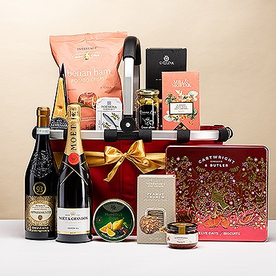 Our Royal Carry Bag is a spectacular gourmet gift basket for Christmas, VIP corporate gifts, and family celebrations. Reisenthel&#39;s award-winning, reusable Red Carry Bag is filled with a fantastic array of our premier products for a gift that is sure to make an impression. This luxury gourmet gift includes elegant Moët & Chandon Brut Champagne and a beautiful red wine.