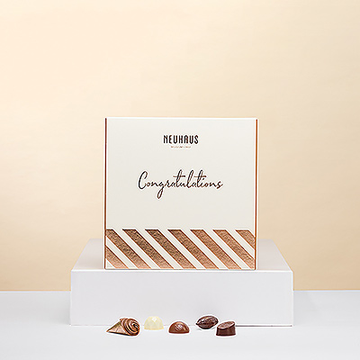 La meilleure façon de féliciter quelqu'un est de lui faire une douce surprise. Ce coffret de félicitations du maître chocolatier belge Neuhaus est le cadeau idéal pour tout amateur de chocolat.