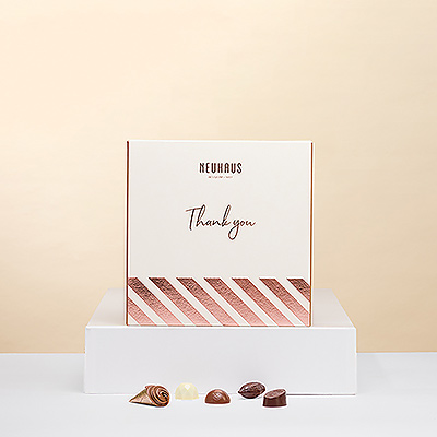 Dar las gracias es mejor con una dulce sorpresa. Esta caja de regalo del maestro chocolatero belga Neuhaus es el obsequio ideal para cualquier amante del chocolate.