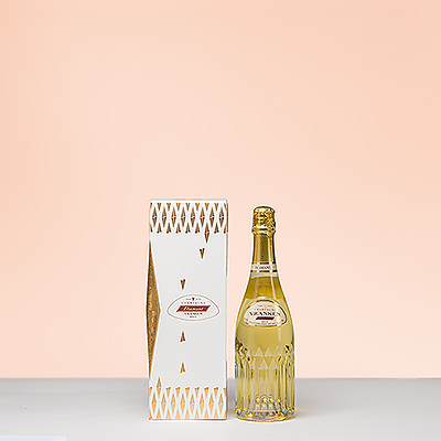 The bottle of champagne is stylishly presented in a luxurious champagne gift box.