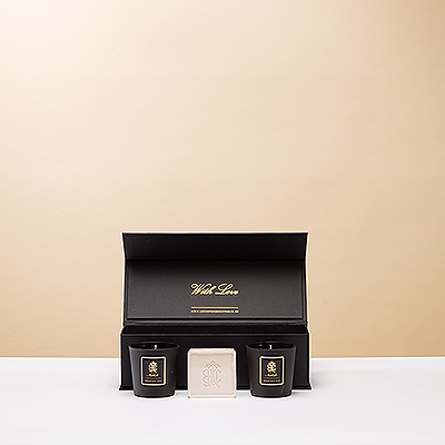 A double treat for the senses comes in the form of the Mountain Chic Candle & Soap Triplet . In this stylish magnet gift box await two lovely scented candles, as well as a heavenly-smelling square of soap.