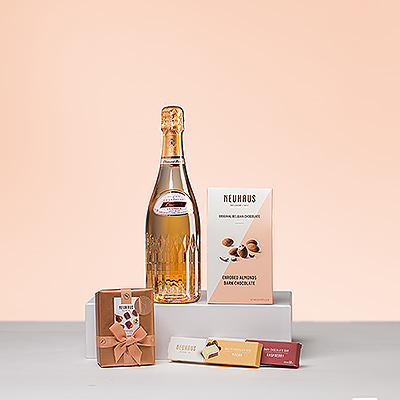 This creation is a diamond of our gift collection. Vranken's Diamant Brut Rosé in a gorgeous bottle is the star of the gift. The fine rosé Champagne is combined with Neuhaus' ultra luxe Belgian chocolate.