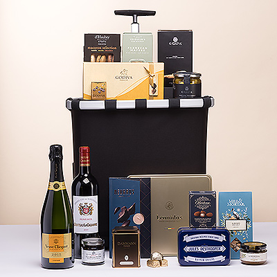 This unique luxe gift is a delicious blend of the best European gourmet foods with award-winning European design. We have hand packed an irresistible collection of sweet and savory snacks into the Reisenthel Carrycruiser. This VIP gift with Veuve Clicquot Vintage Champagne is ideal for holidays, weddings, special birthdays, and for families.