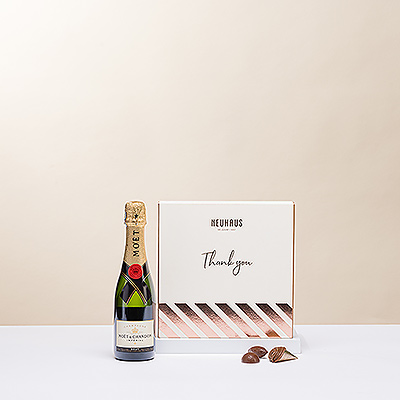 El clásico maridaje de champán y bombones belgas es la forma perfecta de expresar su gratitud. Todo el mundo apreciará el lujoso Champagne Moët Imperial con los deliciosos chocolates belgas Neuhaus en una caja de regalo especial "Gracias".