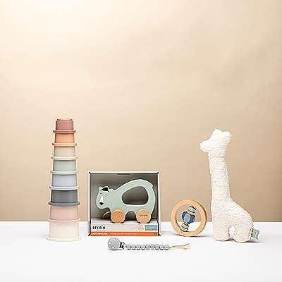 Introducing The Ultimate Baby Gift Set, the perfect all-in-one newborn gift. This thoughtfully curated box contains five essential items for development, play, and comfort from top brands like Trixie and Mushie. From a soft rattle to a wooden pull-along toy, each product is chosen to stimulate the senses. Give a package full of joy, quality, and practical must-haves, guaranteed to be a hit with every baby and parent.