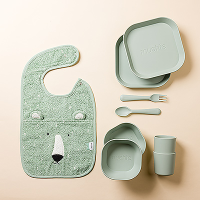 Dinnertime will be healthy, happy, and fun with this Mushie dinner set and Mr. Polar Bear bib by Trixie. It is a great baby shower or newborn gift idea.