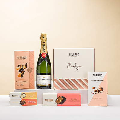 No hay mejor manera de decir &#34;Gracias&#34; que con una magnífica colección de chocolates belgas premium de Neuhaus y Godiva maridados con el festivo Champagne Moët & Chandon.