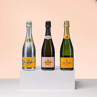 El Champagne Veuve Clicquot es sinónimo de prestigio y elegancia. Para un regalo inolvidable, presente este exquisito trío de los finos Champagnes de Veuve Clicquot: el clásico Brut, el encantador Rosé y el fresco "Rico".