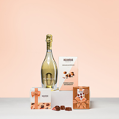 Un cadeau élégant et festif pour toutes les occasions : Le vin mousseux sans alcool Bottega Zero et l'irrésistible chocolat belge Neuhaus.