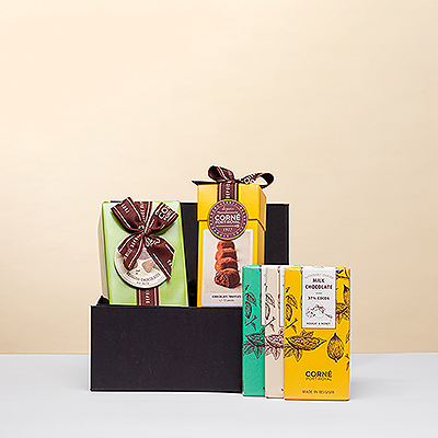 Überraschen Sie jemanden mit dem süßen Genuss von Milchschokolade mit diesem Geschenkkorb, gefüllt mit feinen Corné Port-Royal Pralinen aus Belgien.