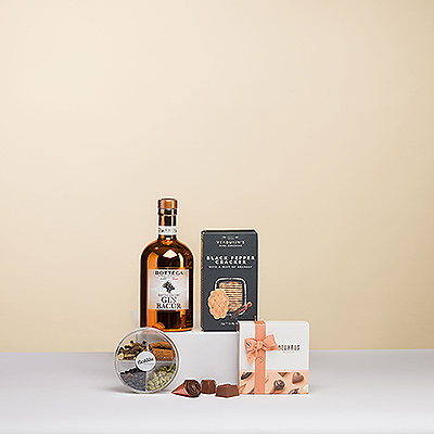 Un regalo distintivo y sofisticado para los amantes del buen gusto. La ginebra Bottega Bacur se combina con seis emblemáticos chocolates belgas Neuhaus y galletas Verduijn de pimienta negra y sal marina para un regalo especial para dos.