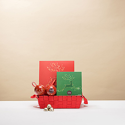 Machen Sie sich ein süßes und fröhliches Weihnachtsfest mit diesem köstlichen Corné Port-Royal Schokoladen Geschenkkorb, in dem die ganze Familie Platz findet.