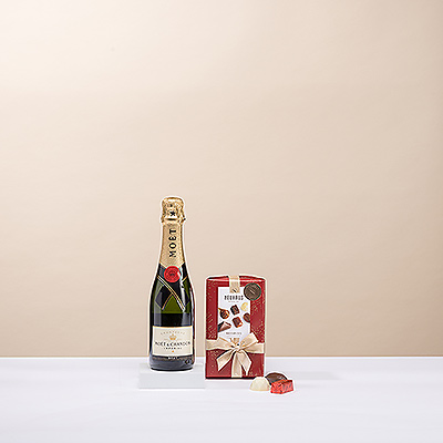 Célébrez Noël avec les joies somptueuses des chocolats belges Neuhaus et du champagne pétillant Moët & Chandon.