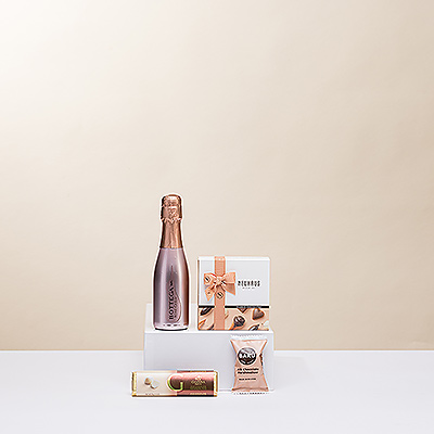 Everyone needs a little treat sometimes! Spoil yourself or a loved one with a wonderful combination of sparkling spumante, six assorted Neuhaus luxury Belgian chocolates, a scrumptious Godiva chocolate bar, and a fluffy Barú chocolate dipped marshmallow.