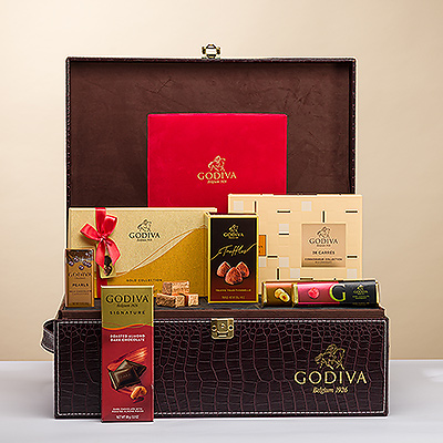 Nouveau pour Noël 2023 et le Nouvel An : un panier cadeau avec le logo Godiva et une délicieuse collection de luxueux chocolats Godiva.