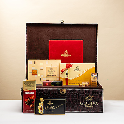 Perfect for life's most important occasions: a stunning Godiva logo croco gift hamper with a scrumptious collection of luxurious Godiva chocolates. This impressive VIP gift is the sweetest way to celebrate milestone birthdays, weddings, or business successes.