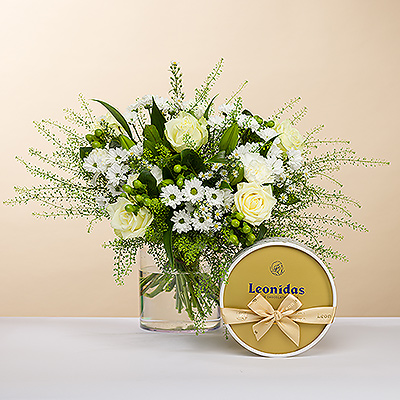 As bright as a twinkling diamond, we present you this stylish bouquet, all in white. The bouquet is accompanied by a lovely round box of classic Leonidas chocolates for a delightful gift experience.