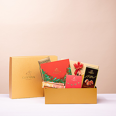 Envoyez des vœux chaleureux pour les fêtes de fin d'année et souhaitez-leur une bonne année avec un coffret cadeau doré rempli des meilleurs chocolats Godiva.