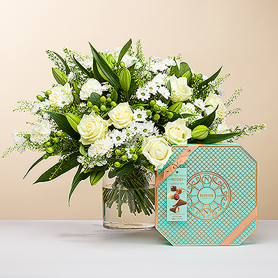 As bright as a twinkling diamond, we present you this stylish bouquet, all in white. The bouquet is accompanied by an exquisite box of sumptuous Neuhaus Belgian chocolates for an unforgettable gift experience.